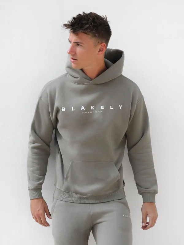 Men hoodie for gym workouts with moisture - wicking technology Evolved Relaxed Hoodie - Safari Green Men hoodie for gym workouts with moisture - wicking technology Evolved Relaxed Hoodie - Safari Green