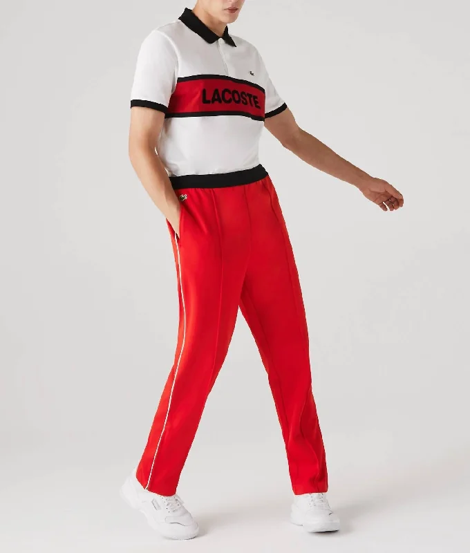 Men's Run-Resistant Pleated Tracksuit Pants In Red/black/white