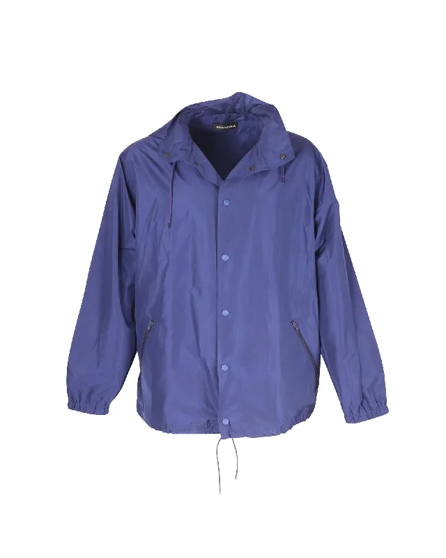 Men jackets with a built - in hood that can be stowed away when not in useBalenciaga Windbreaker Logo Jacket in Blue Polyester Men jackets with a built - in hood that can be stowed away when not in useBalenciaga Windbreaker Logo Jacket in Blue Polyester
