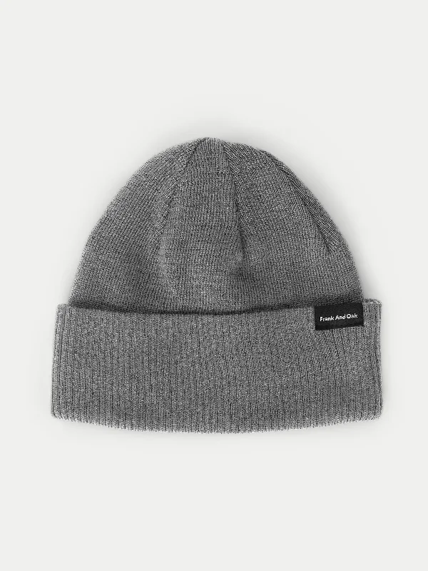Men's snow jacket with a striped patternThe Merino Wool Beanie in Medium Grey
